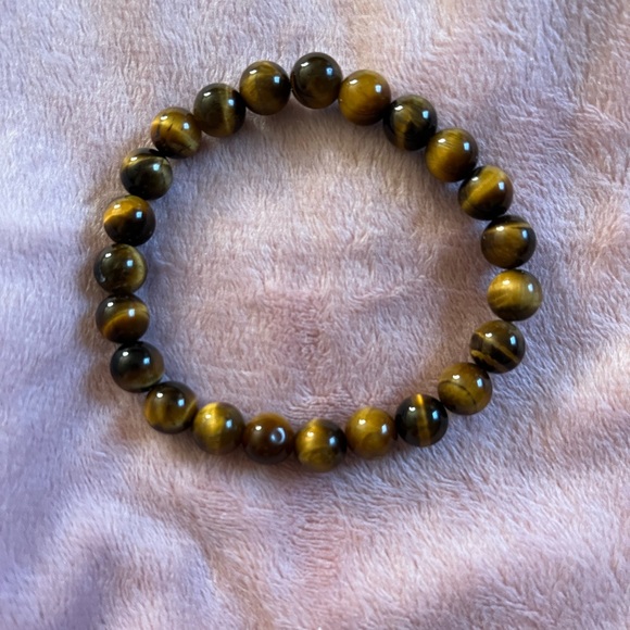 not sure Other - Men’s Tiger Eye stretchy bracelet it’s eye catching